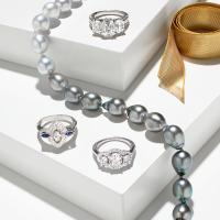Diamond baguette and princess cut ring in 14K white gold, White and black South Sea pearls with silver magnetic clasp, Rose cut diamond ring with fancy light grey diamond and sapphires in 14K white gold, Three diamond halo-style ring in 18K white gold. All available at Fortunoff Fine Jewelry, Westbury, (516) 222-7879