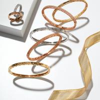 Stackable bangles and bands from the Roberto Coin Symphony Collection. All available at H.L. Gross & Bro. Jewelers, Garden City, (516) 747-6666